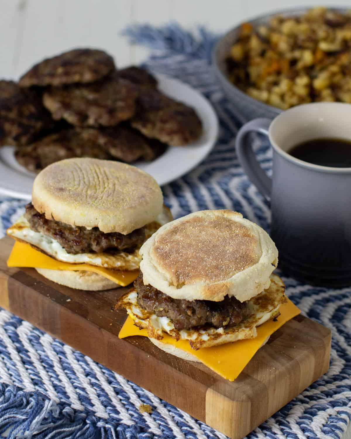 Sausage patties and fried egg in an English muffin.