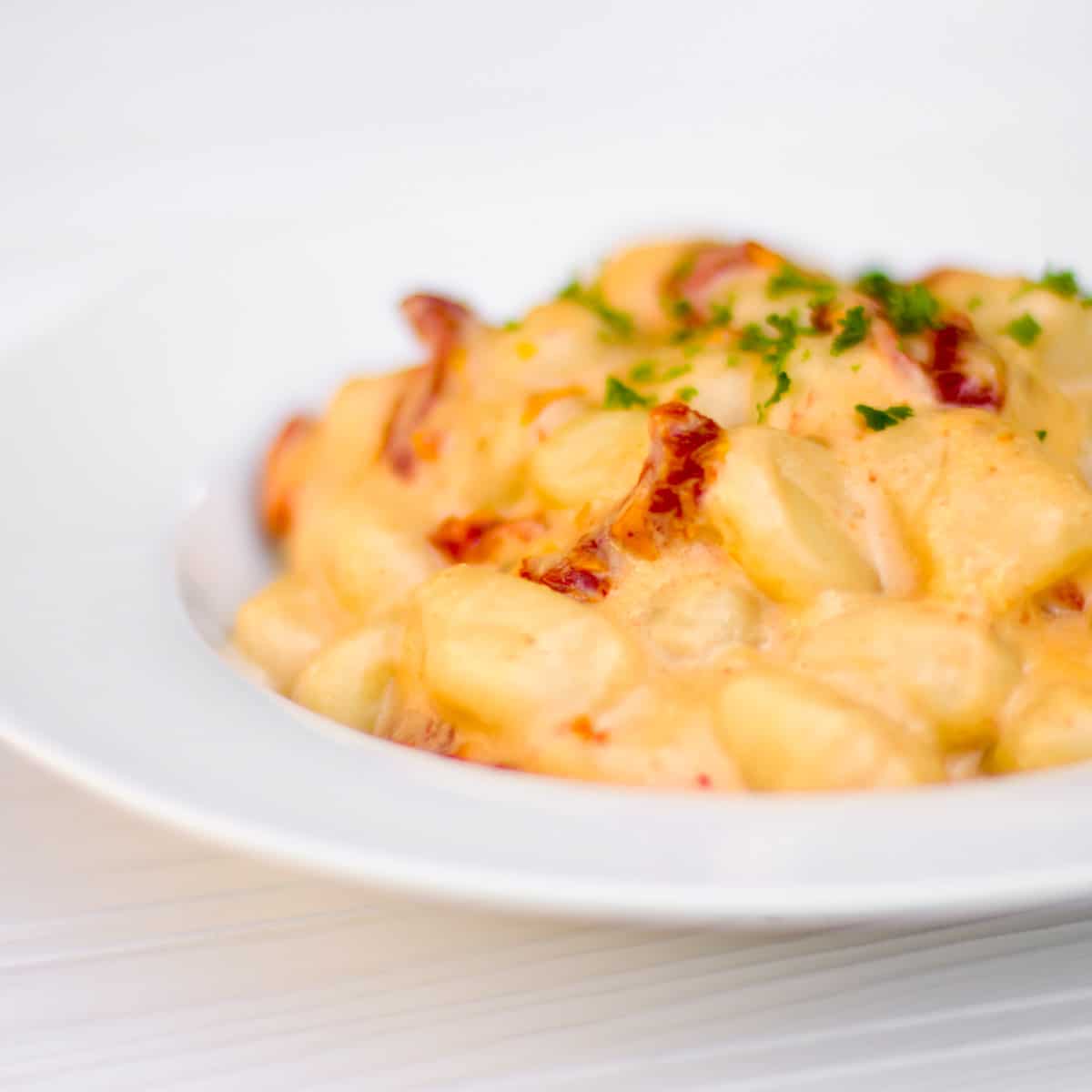 Close up picture of a plate of gnocchi.