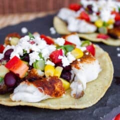 Catfish tostada on a serving slate.