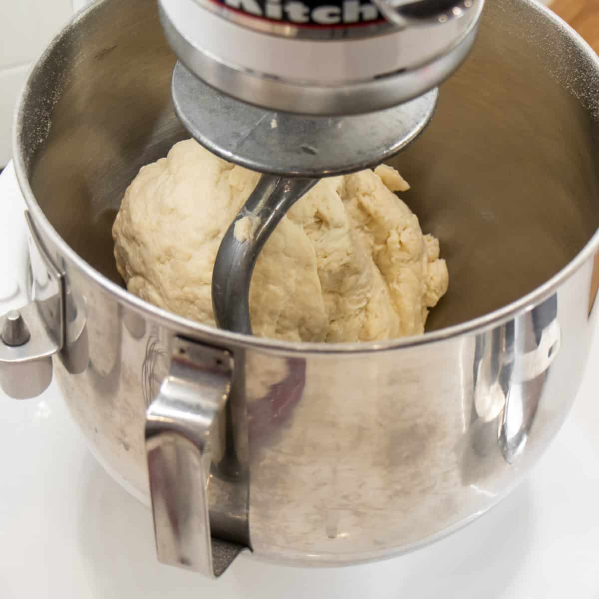 Kneading bread dough in a stand mixer.