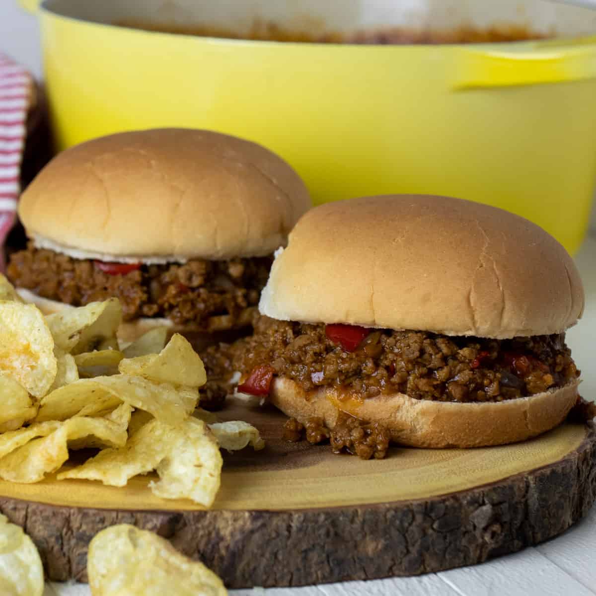 Close up of ground beef mixture in a burger bun.