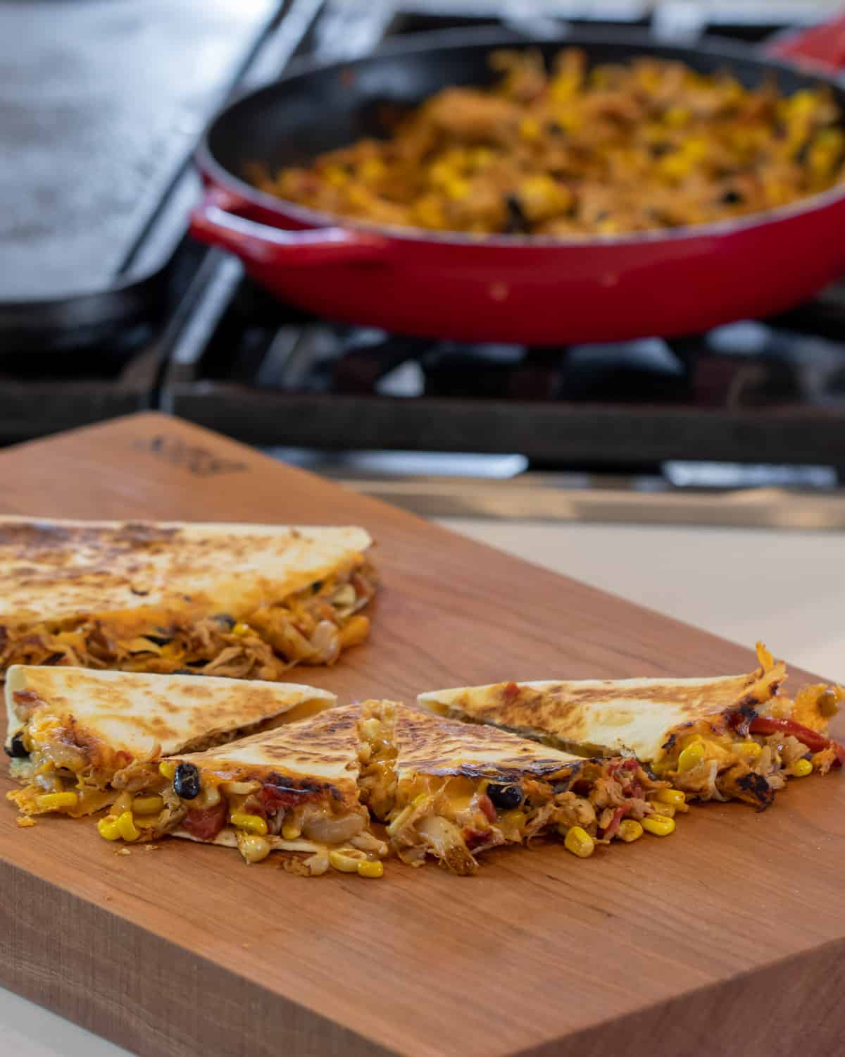 Quesadilla on a cutting board.