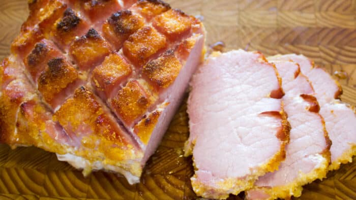 Overhead picture of a cooked roast of peameal bacon.