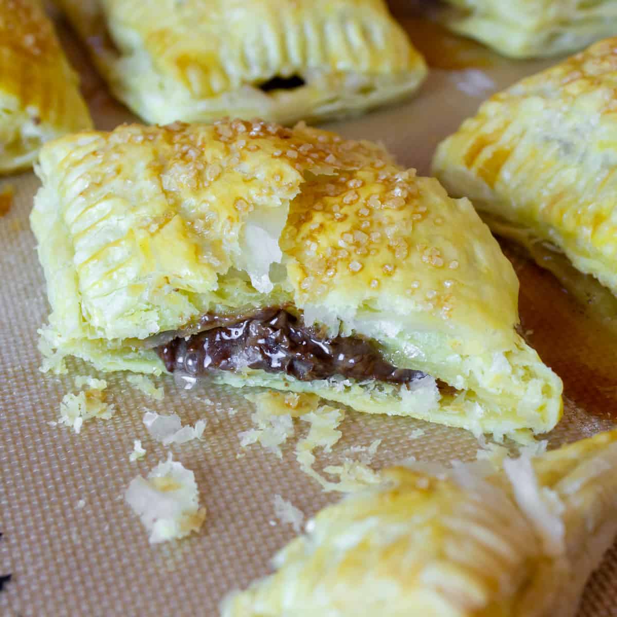 A turnover cut in half to show the chocolate filling.