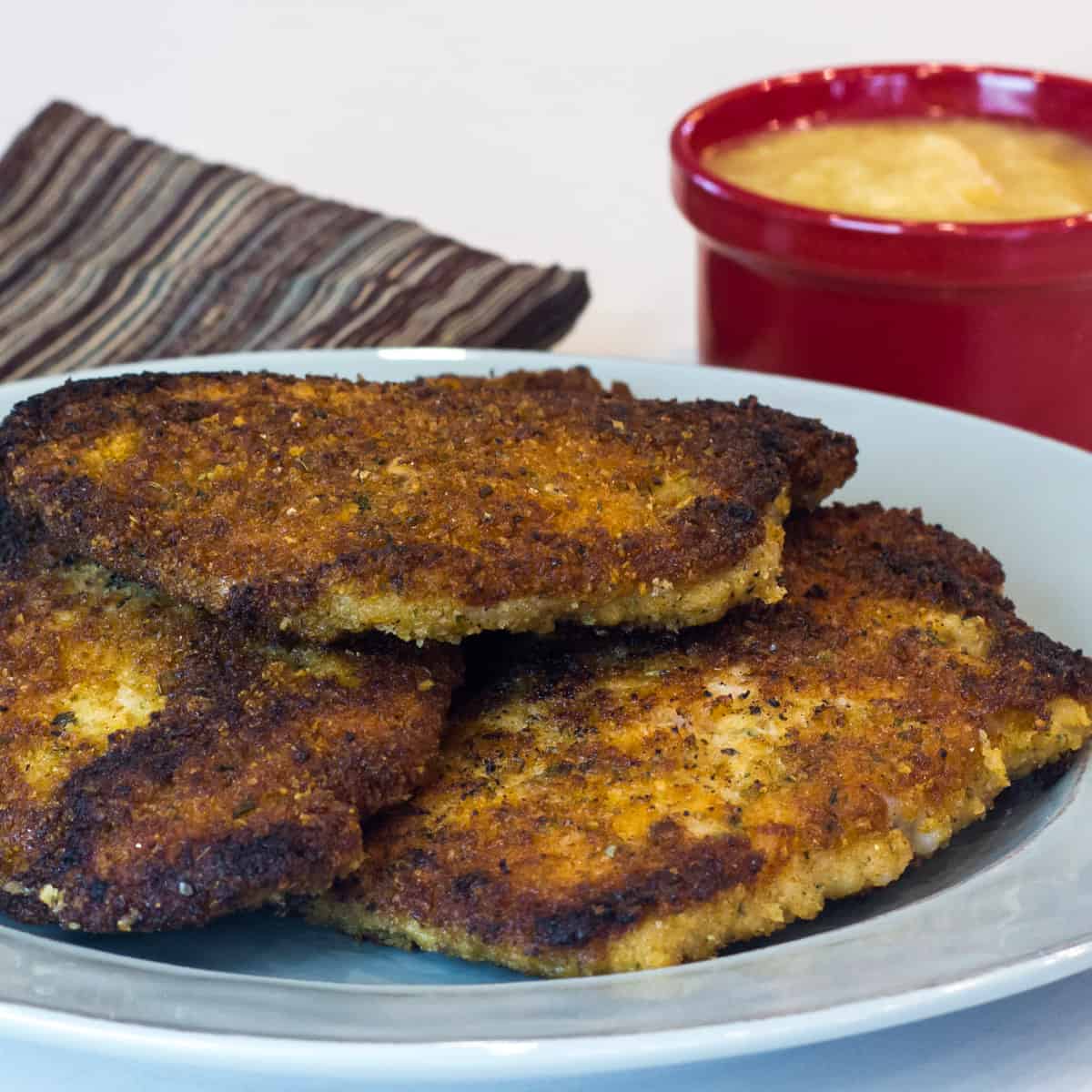 Close up of fried pork chops.