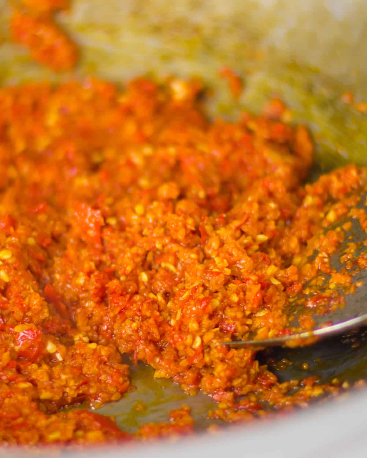 Close up picture of chili pepper in wok.