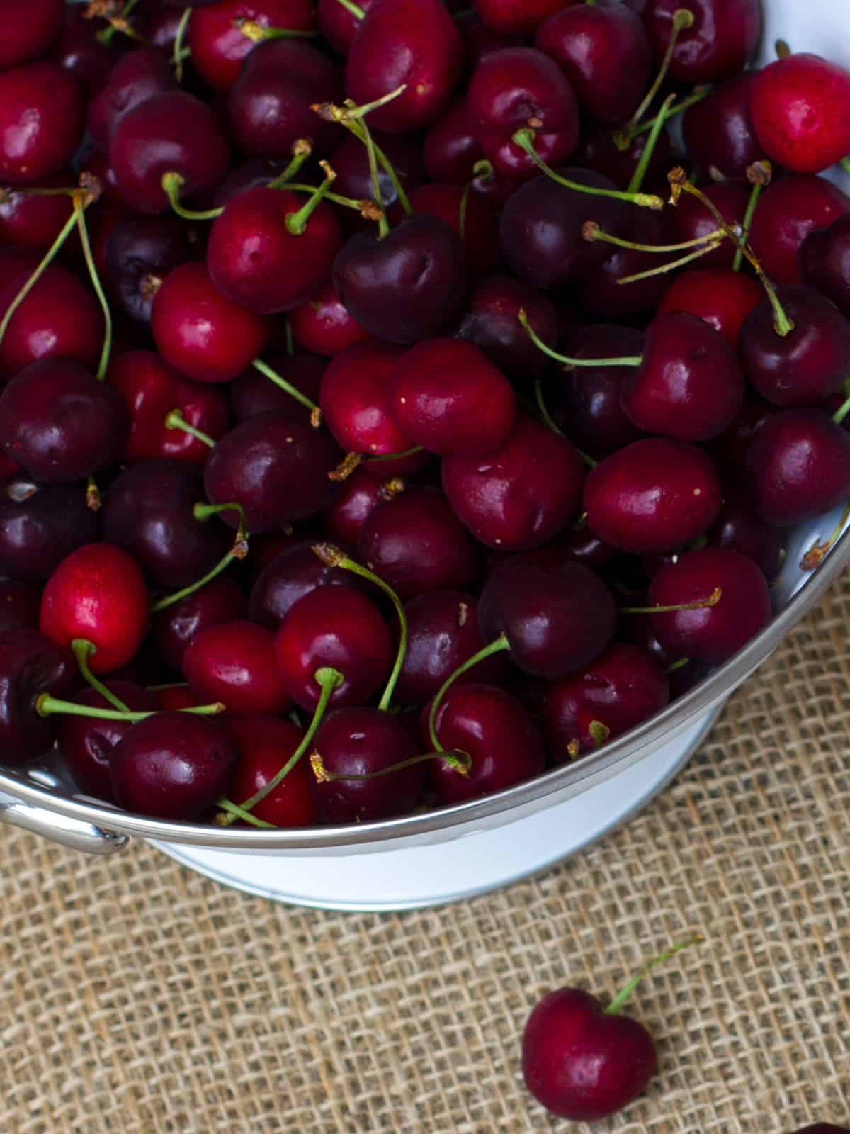 A bowl full of cherries.