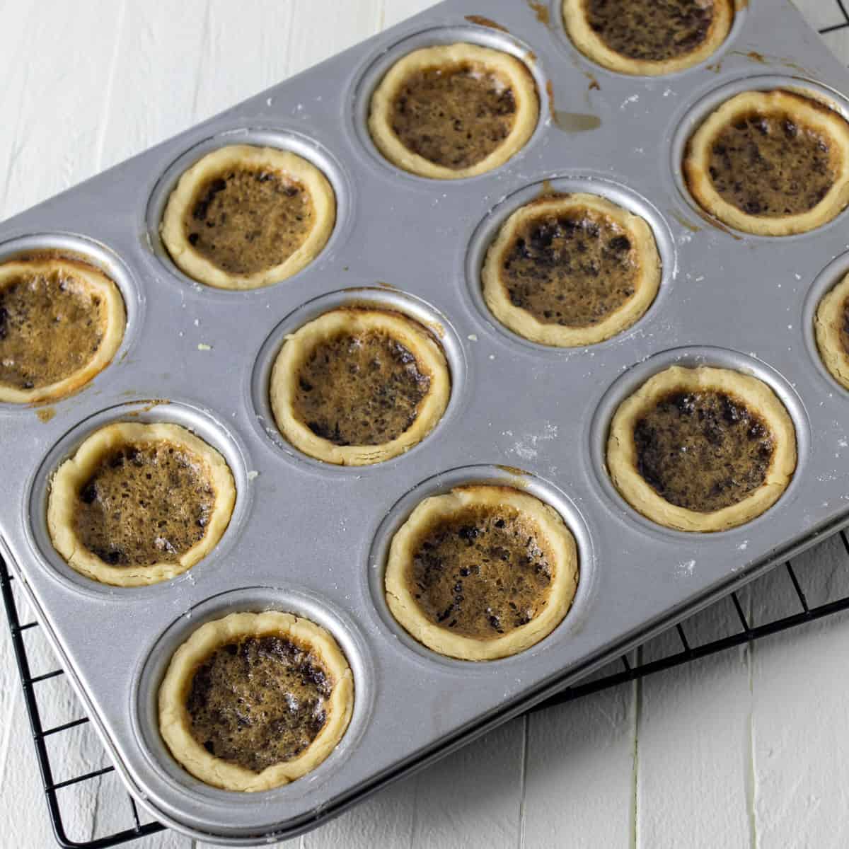 A tray of baked tarts.