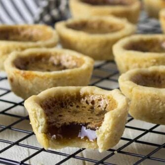 mini tarts on a cooling rack.