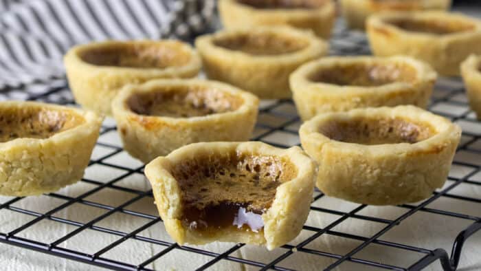 mini tarts on a cooling rack.