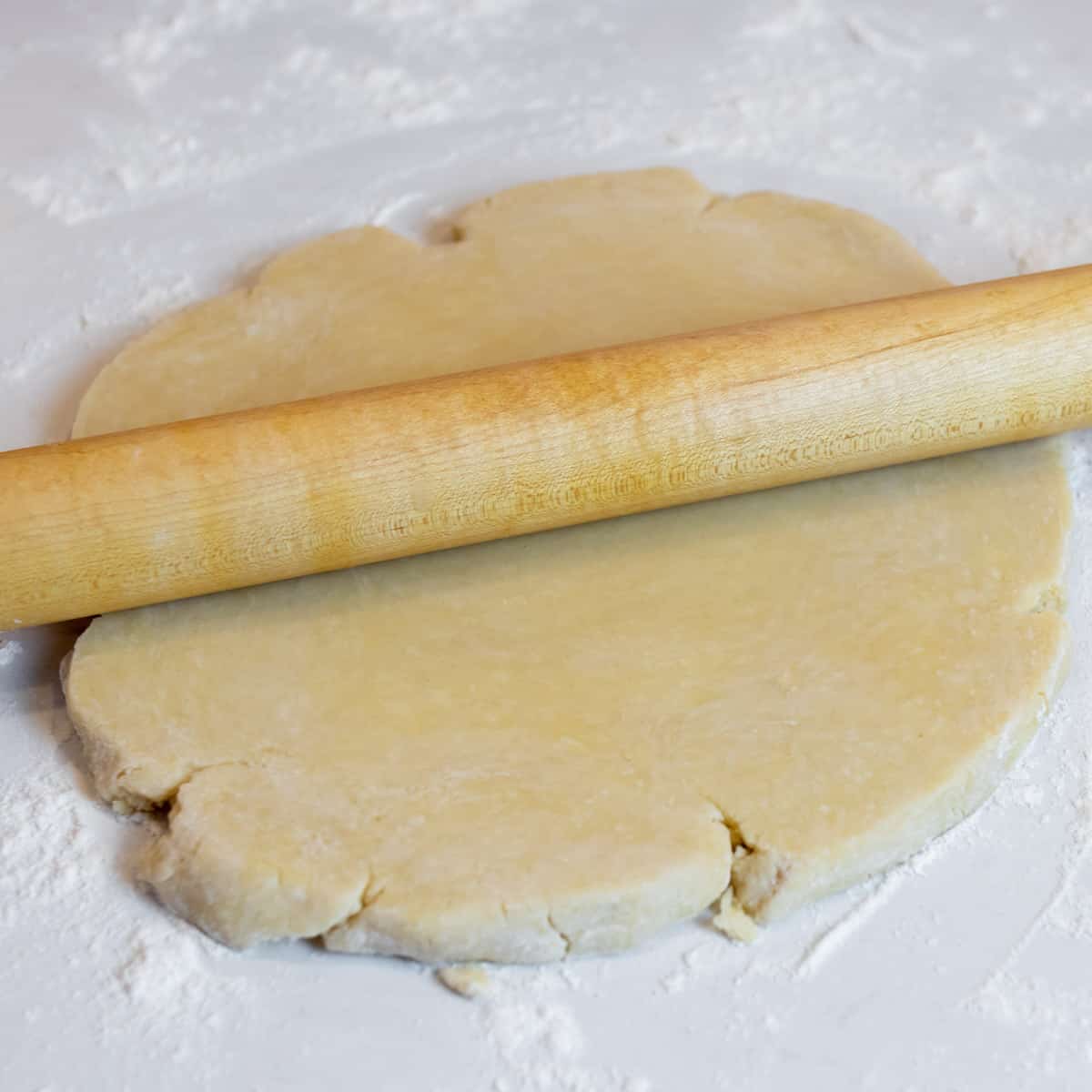 Pie pastry being rolled out.