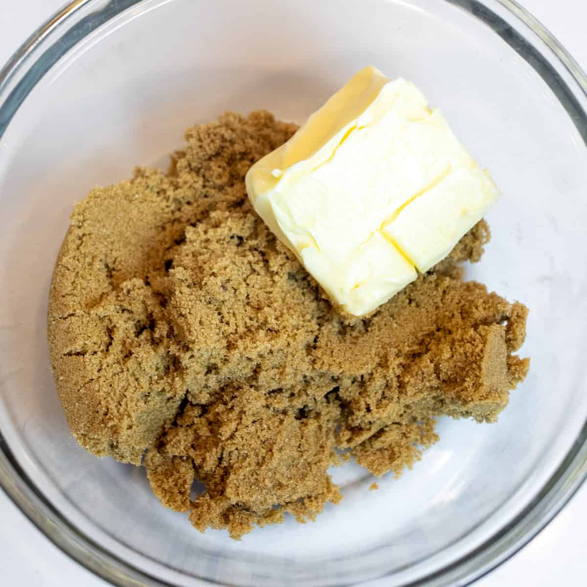 Brown sugar and butter in a bowl.