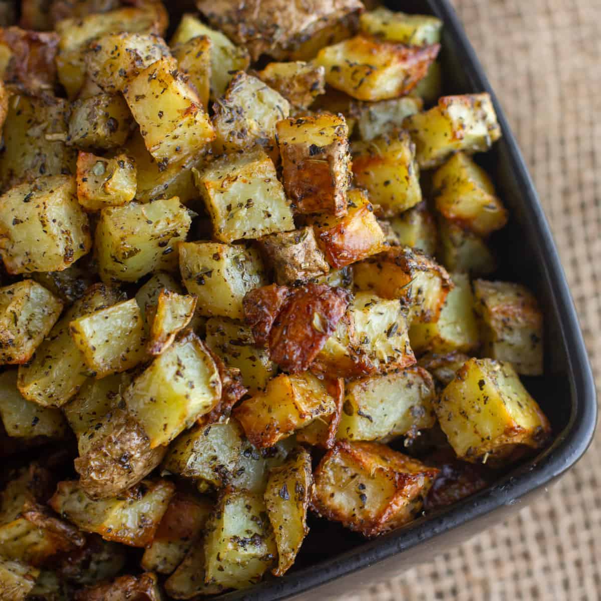Close up picture of roasted cubed potatoes.