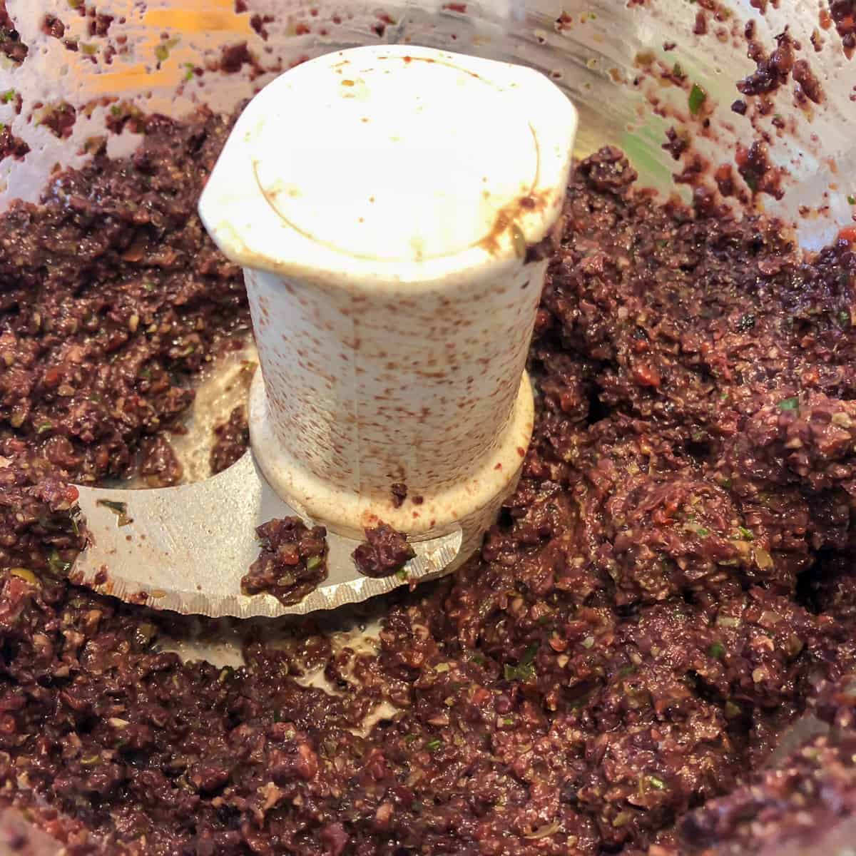 Ingredients pulsed in a food processor to form a paste.