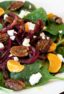 Overhead picture of salad on a white plate.