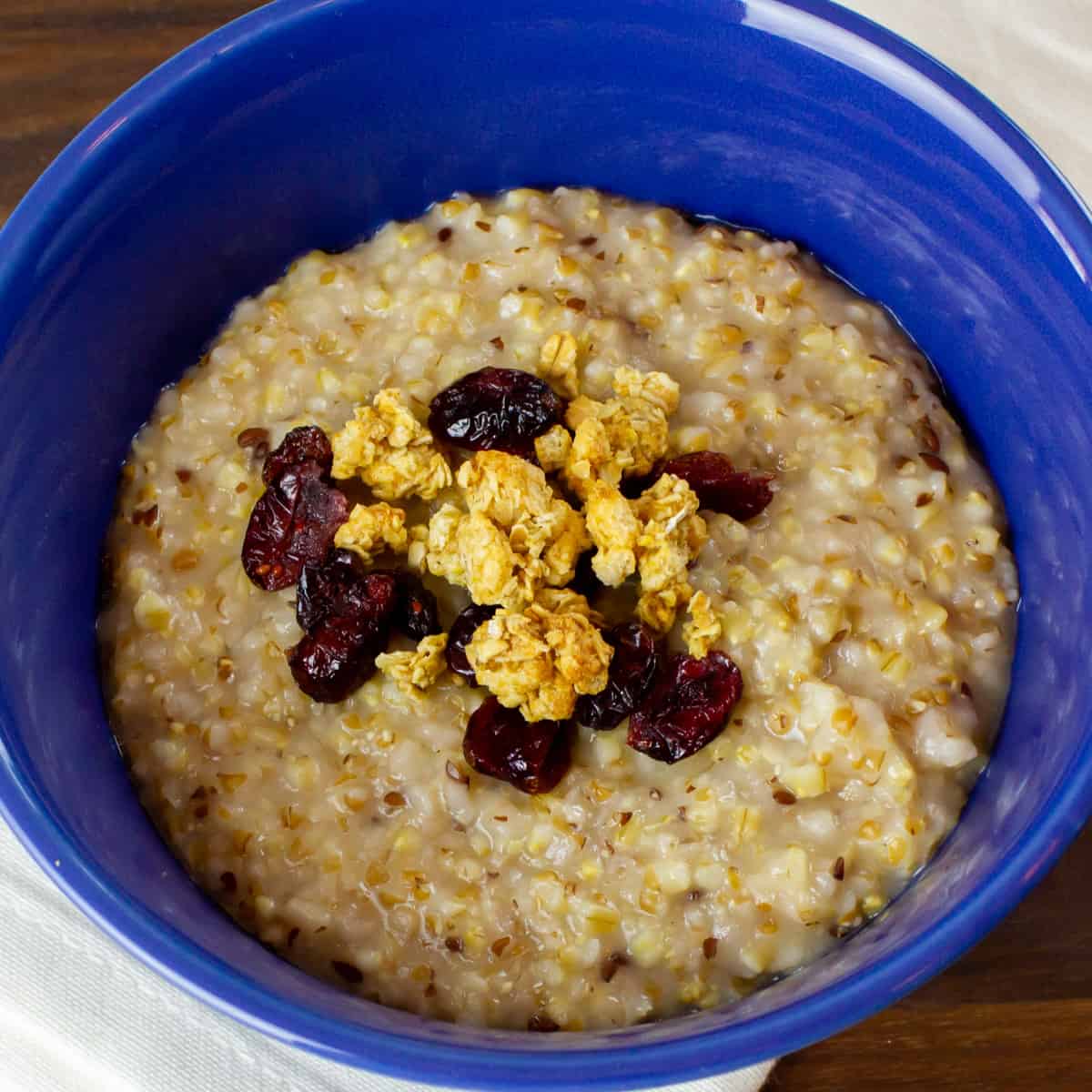 Overhead picture of oatmeal with dried fruit.