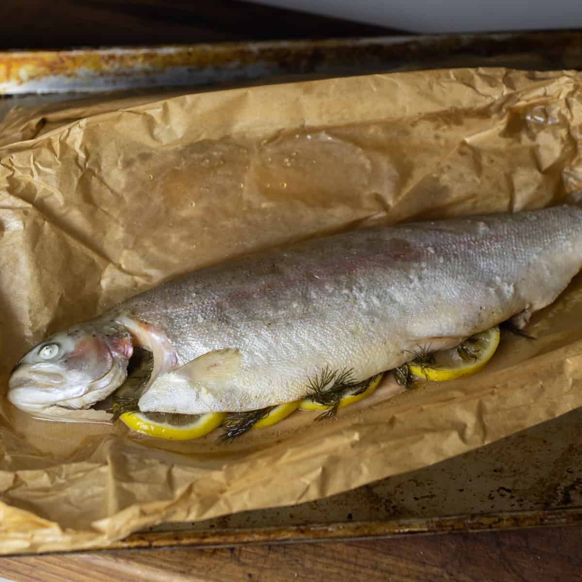 Baked fish with lemon and dill.