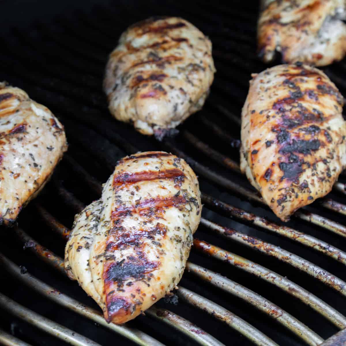 Cooked chicken on a grill.