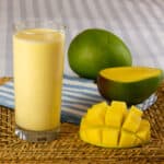 A glass of a fruit smoothie.