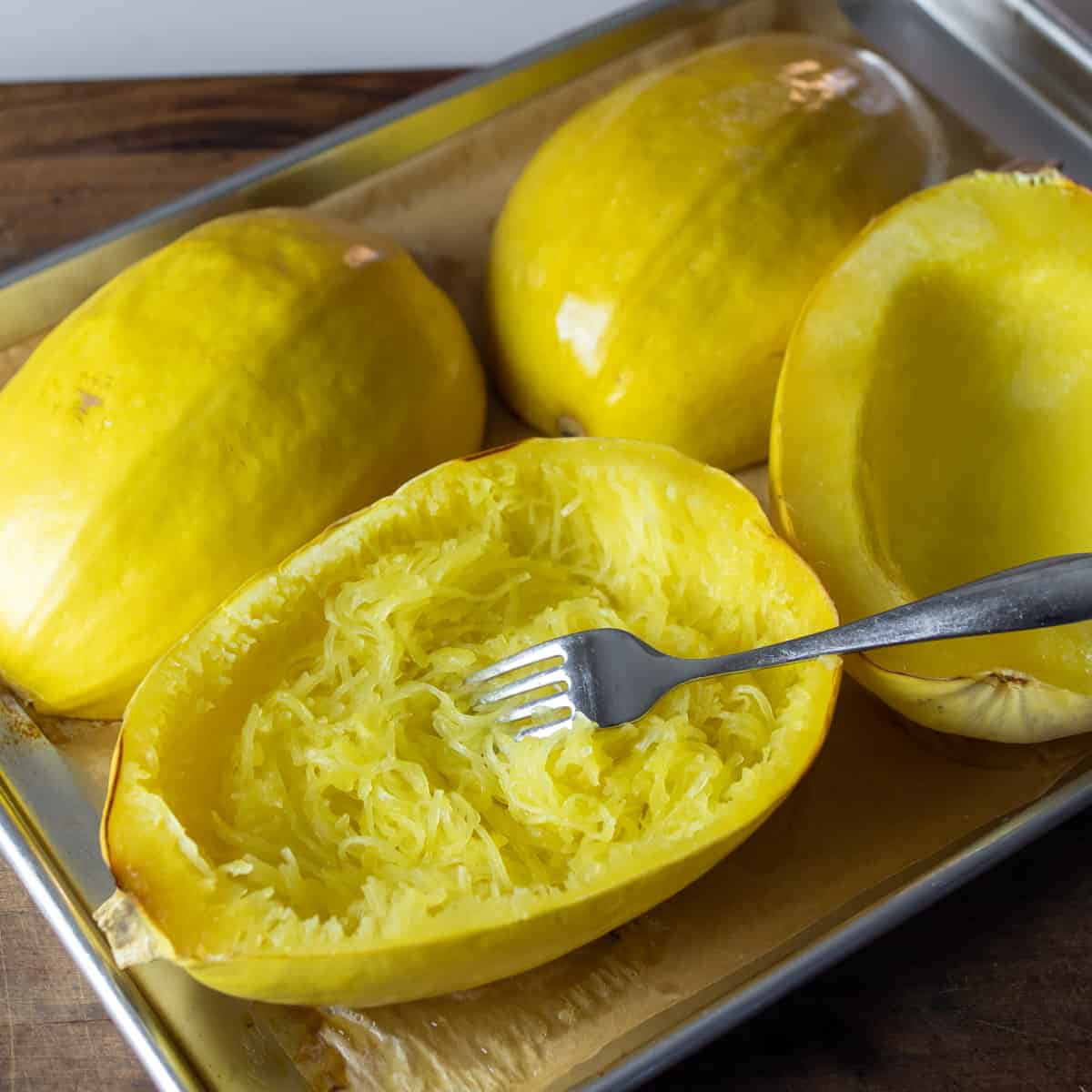 Baked squash on a baking sheet.