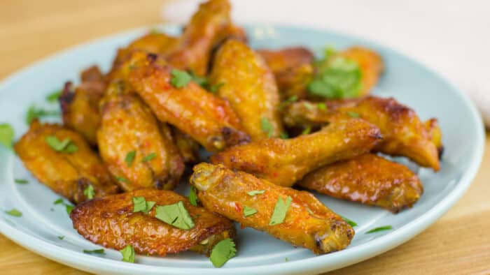 Baked wings on a plate.