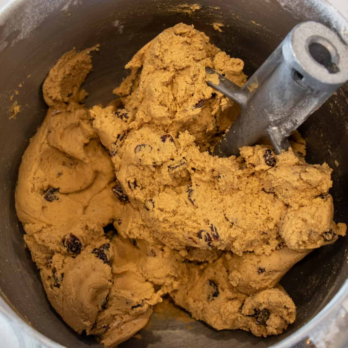Cookie dough batter in a mixing bowl.