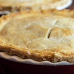 Two fresh baked pies with flaky crust.