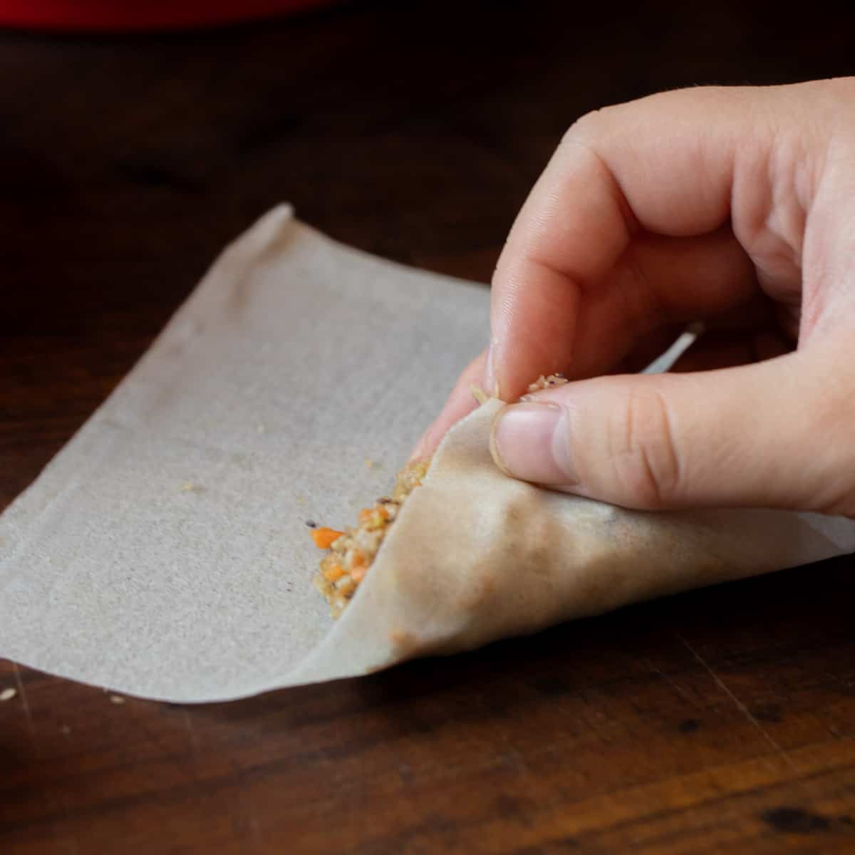 Starting to roll a lumpia.