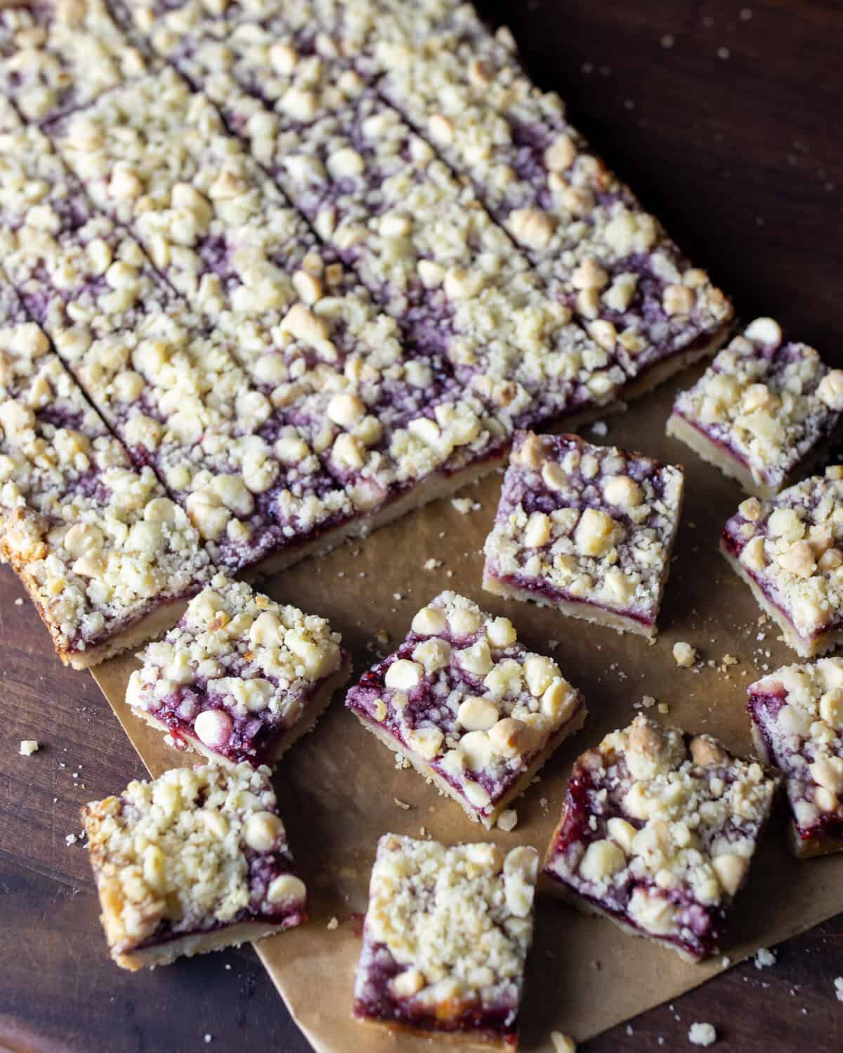 Dessert squares cut on a cutting board.