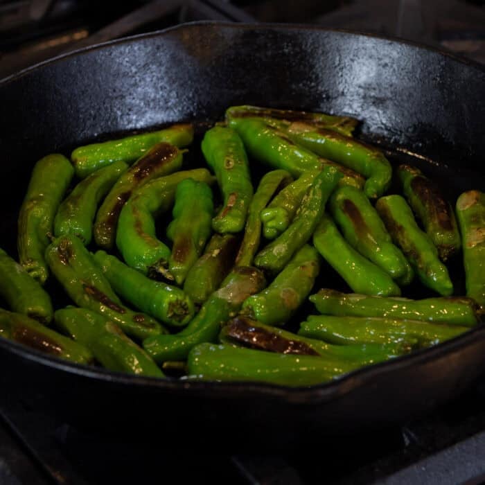 shishito peppers in a skillet